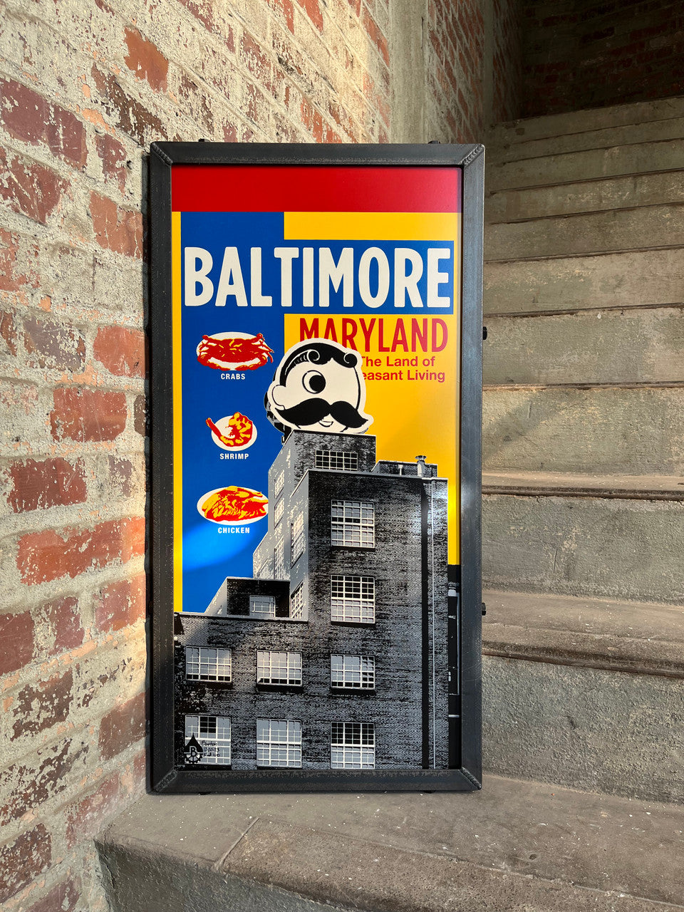 Natty Boh tower with Baltimore background